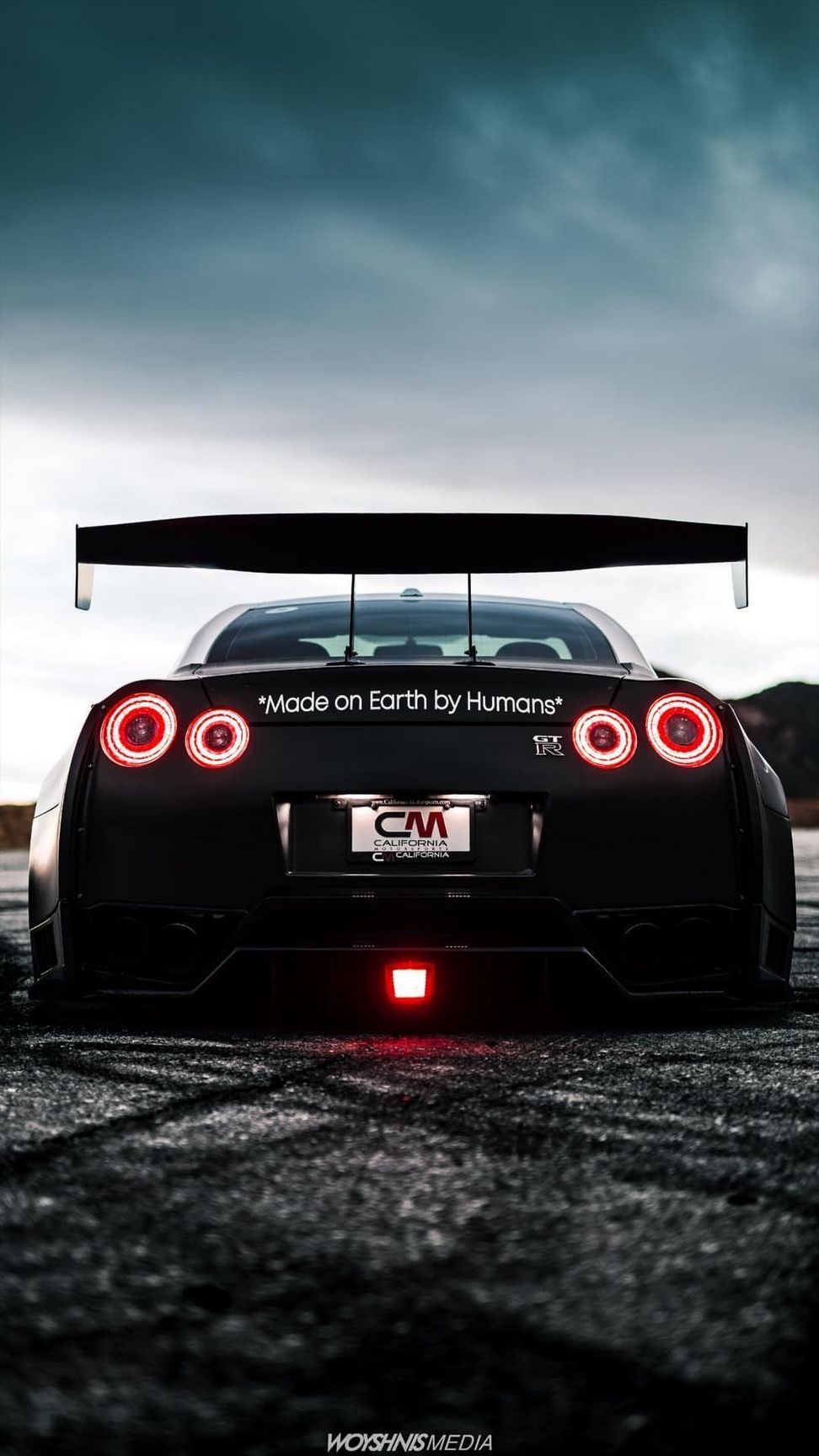 Nissan GT-R nera vista posteriore, 972x1728 Full HD Verticale, Smartphone