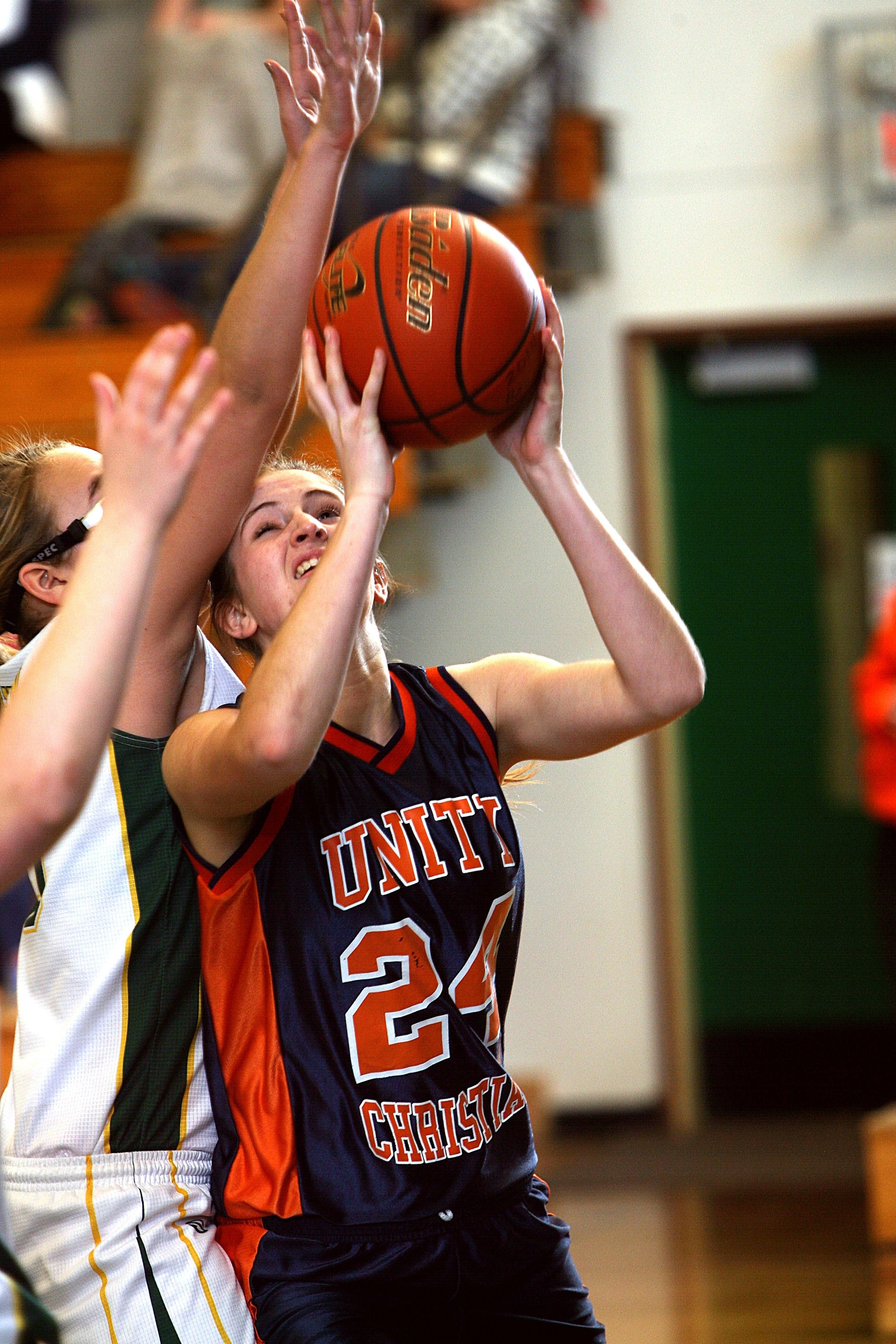 Giocatrice basket femminile Unity Christian, 2336x3504 Verticale, Mobile
