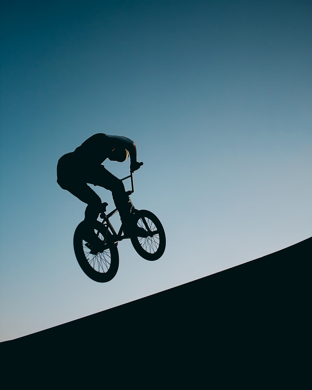 Silhouette ciclista BMX salto, 1000x1250 Verticale, Telefono