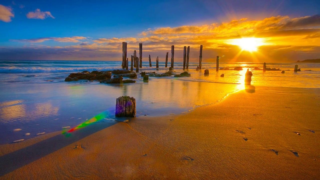 Alba sulla spiaggia con rocce, 1280x720 720p, PC