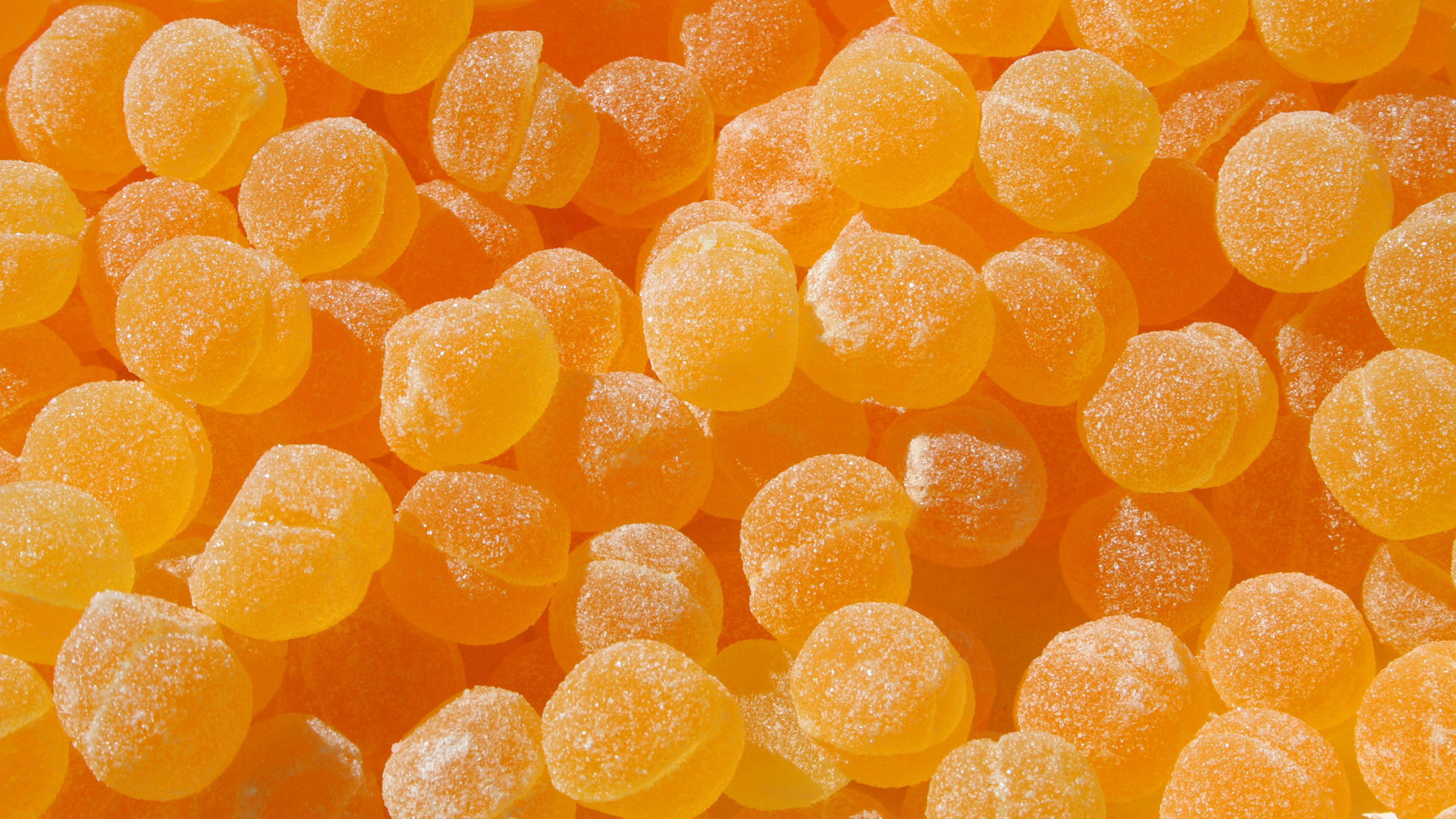 Caramelle gommose arancioni zuccherate, 2560x1440 QHD, Laptop