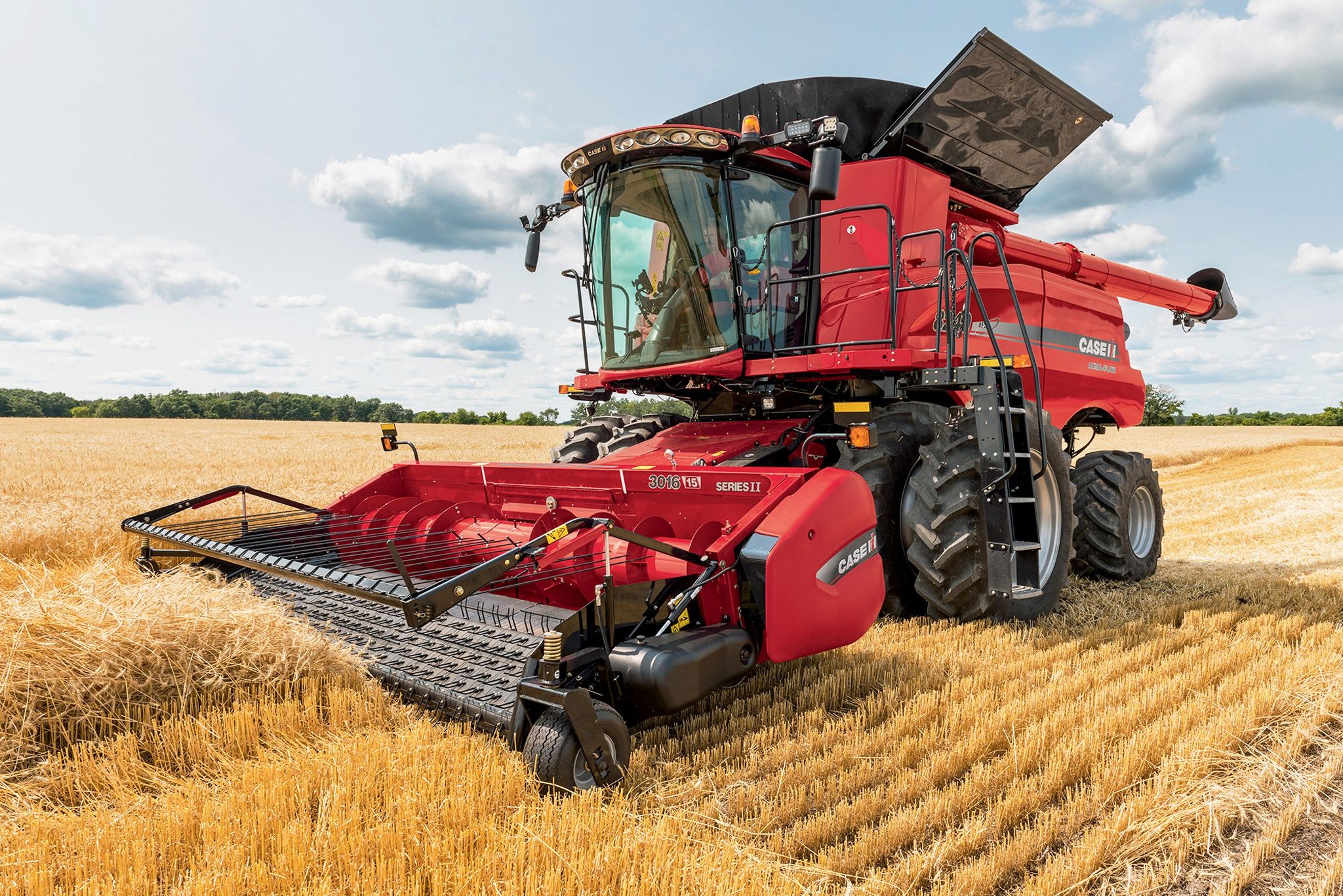 Mietitrebbia Case IH rossa campo, 2048x1367 Hi-Res, Laptop