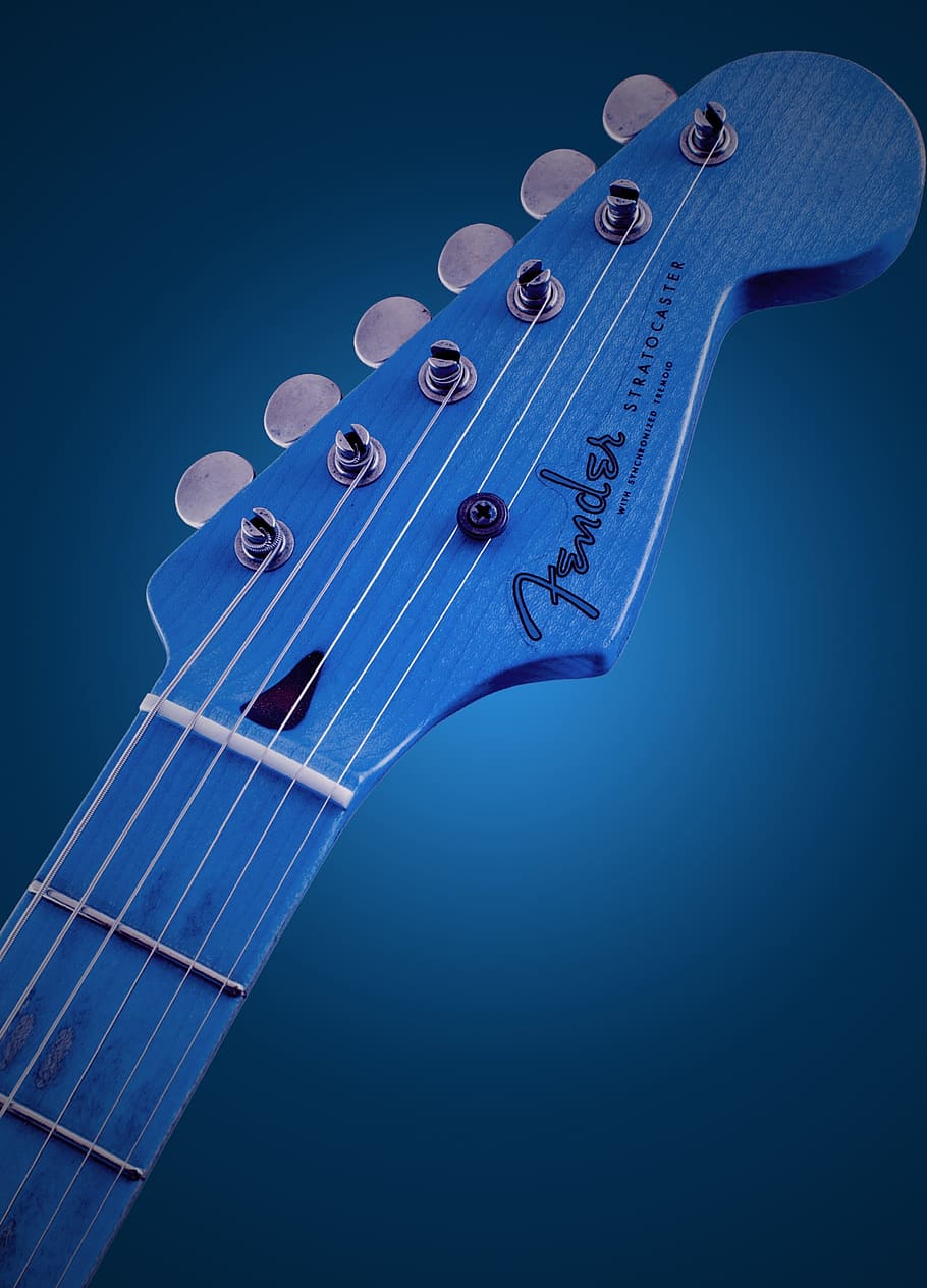 Chitarra Fender blu manico, 910x1264 Full HD Verticale, iPhone Pro