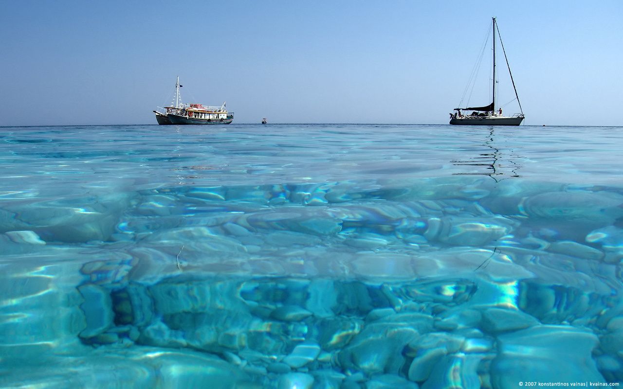 Mare cristallino con barche, 1280x800 720p, PC