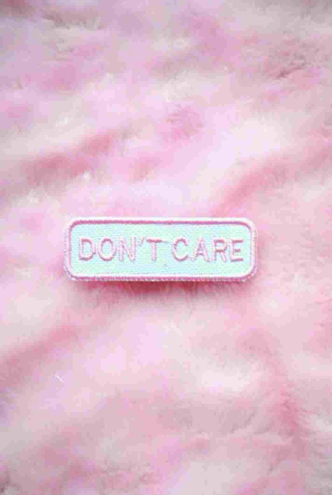 Spilla rosa Don't Care, 1080x1609 Full HD Verticale, iPhone Pro