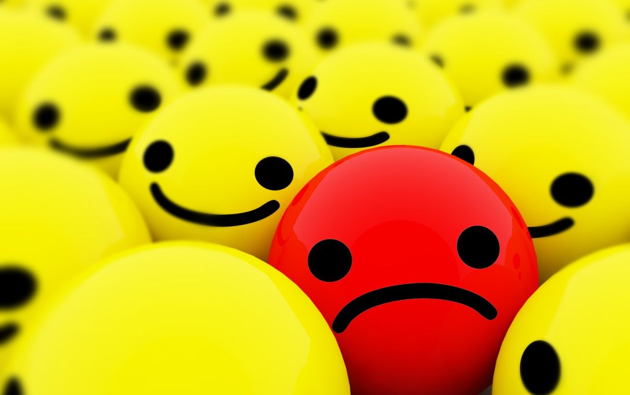 Faccina rossa triste tra gialle, 1280x804 HD, Desktop