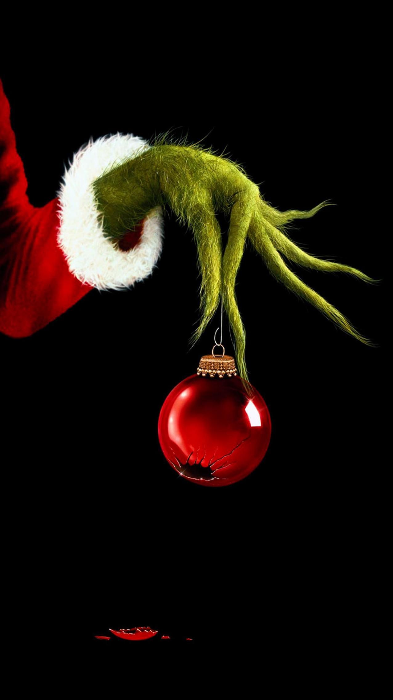 Mano del Grinch con pallina natalizia, 1276x2270 Verticale, Telefono