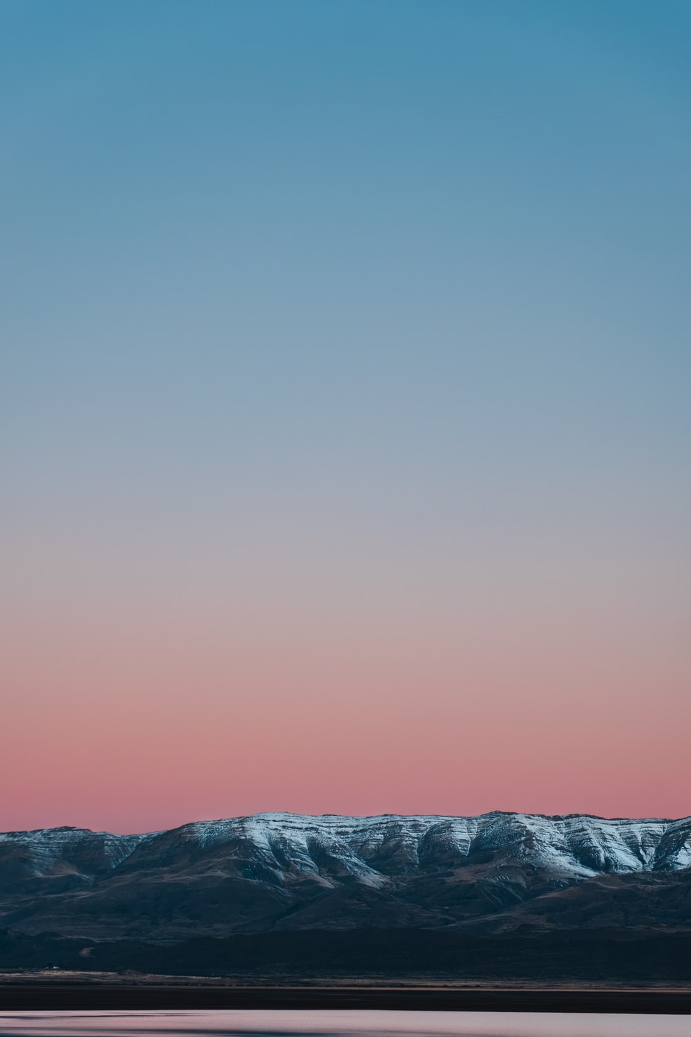 Montagne innevate al tramonto, 1000x1500 Verticale, Mobile
