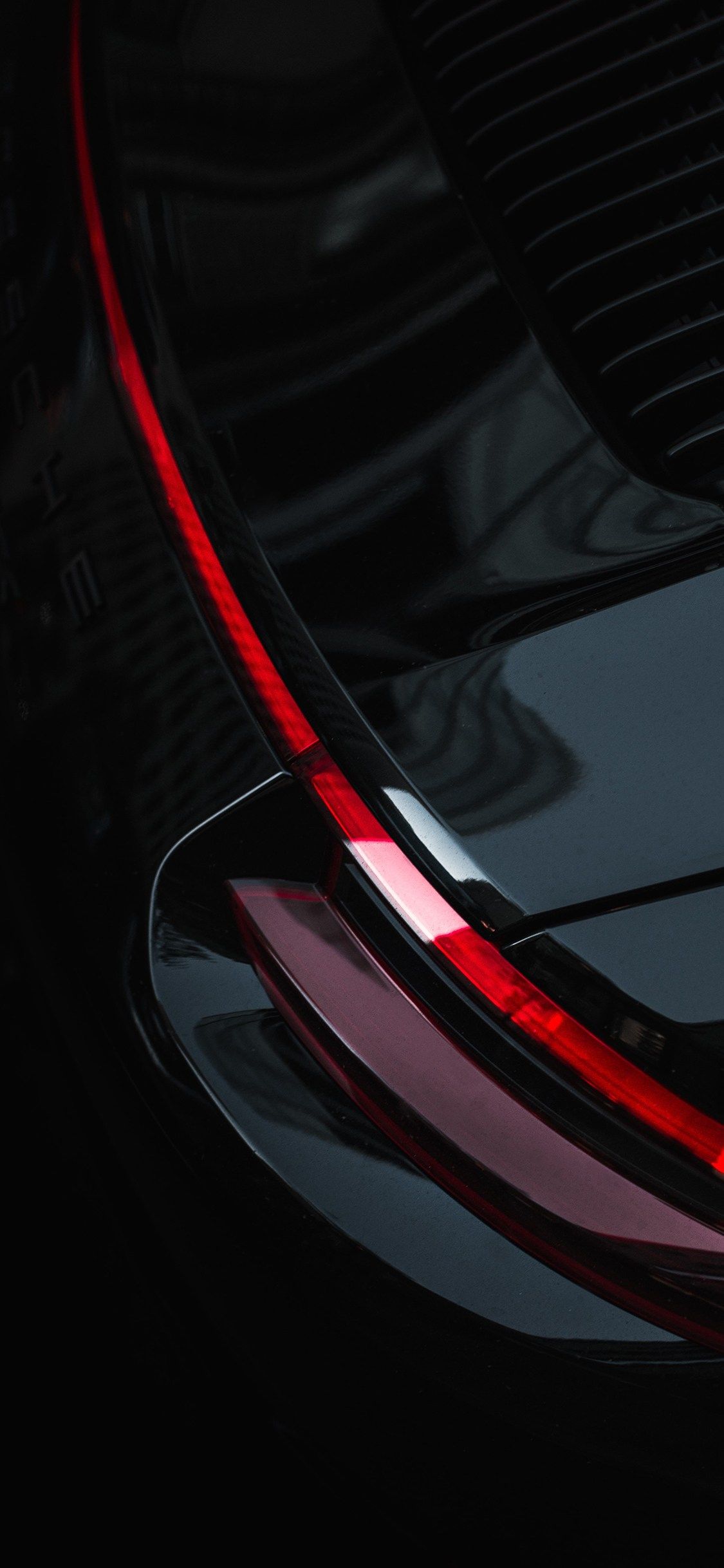 Auto nera dettaglio rosso, 1125x2436 Verticale, iPhone
