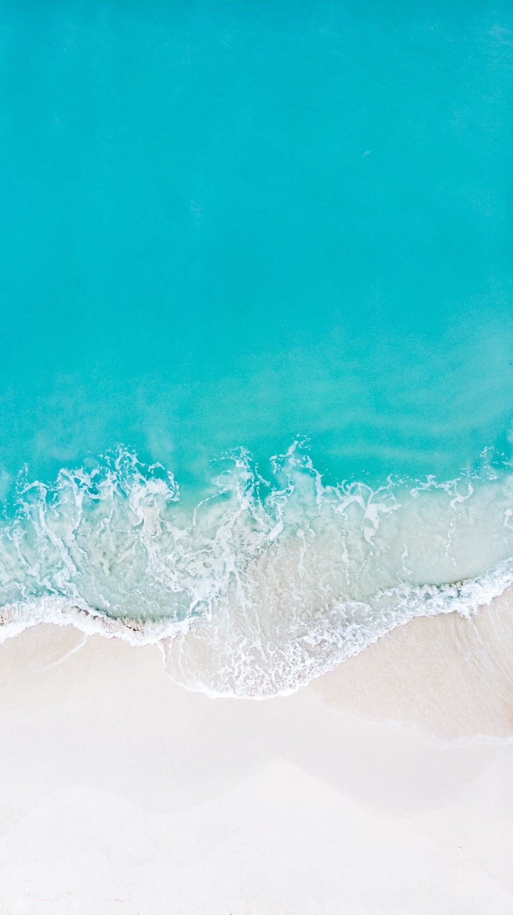 Onde turchesi su spiaggia, 1000x1782 Verticale, iPhone Air