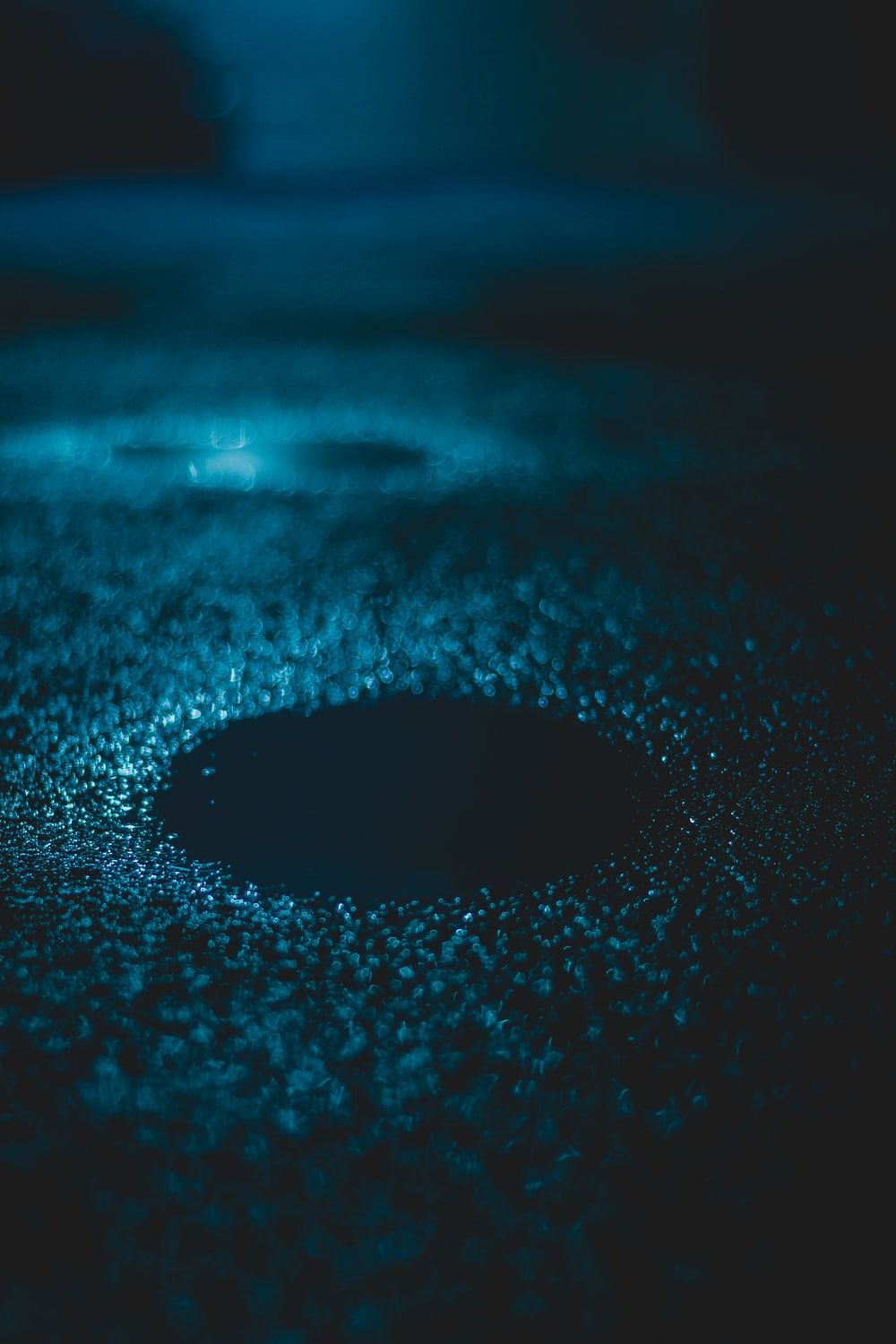 Superficie scura con particelle blu, 1000x1500 Full HD Verticale, iPhone Pro Max