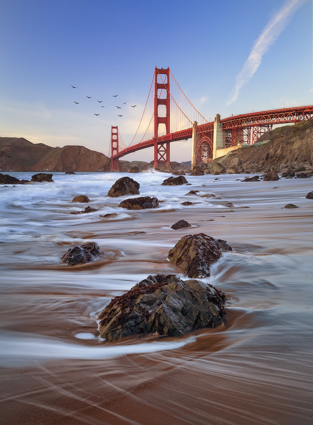 Golden Gate Bridge spiaggia rocce, 1000x1358 Verticale, iPhone Air