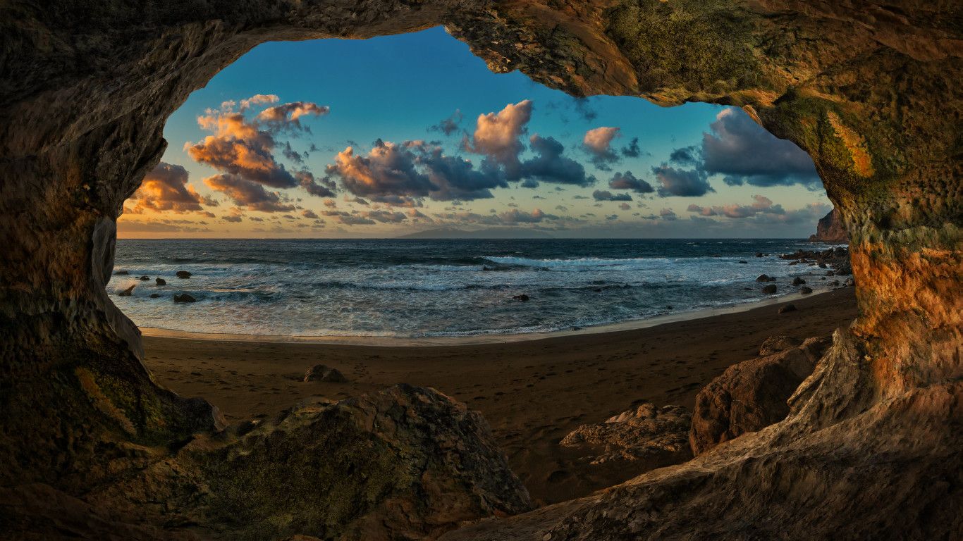 Grotta rocciosa vista mare tramonto, 1366x768 720p, Laptop