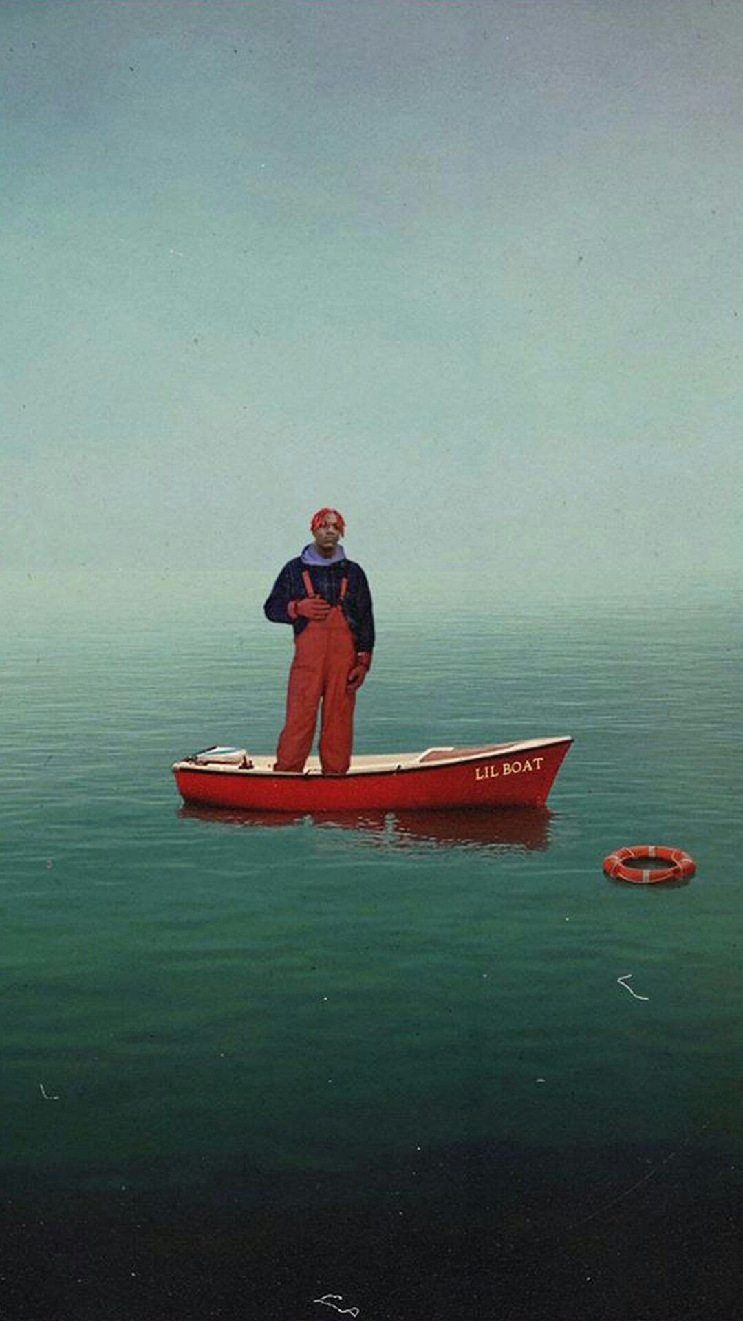 Uomo su piccola barca rossa, 1080x1920 Verticale, Telefono