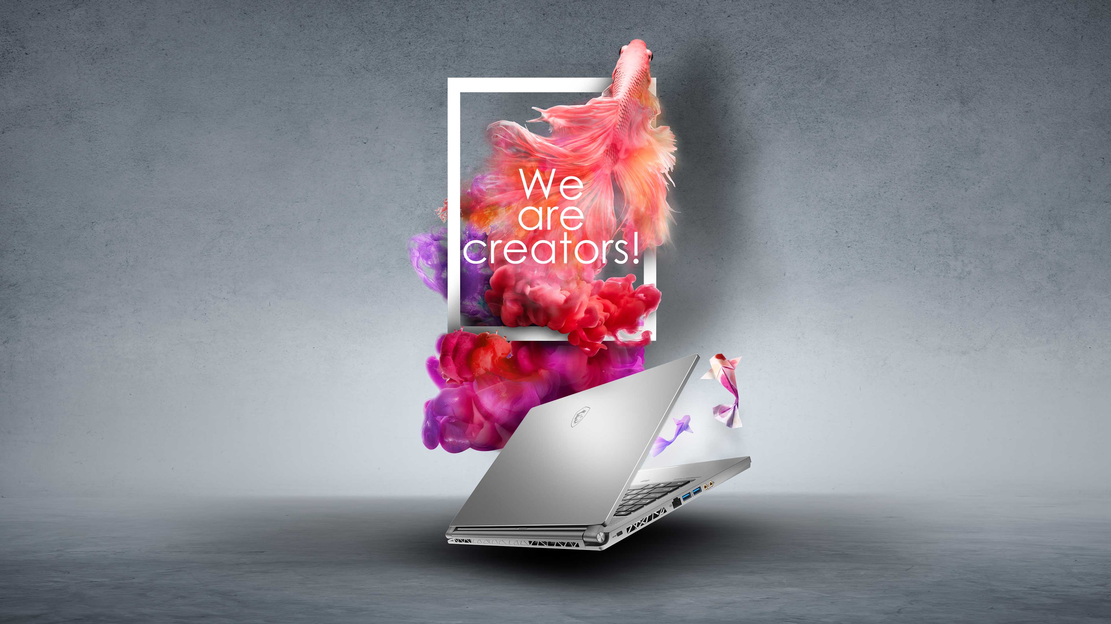 Laptop MSI con esplosione colorata, 3840x2160 4K Ultra HD, Monitor 4K