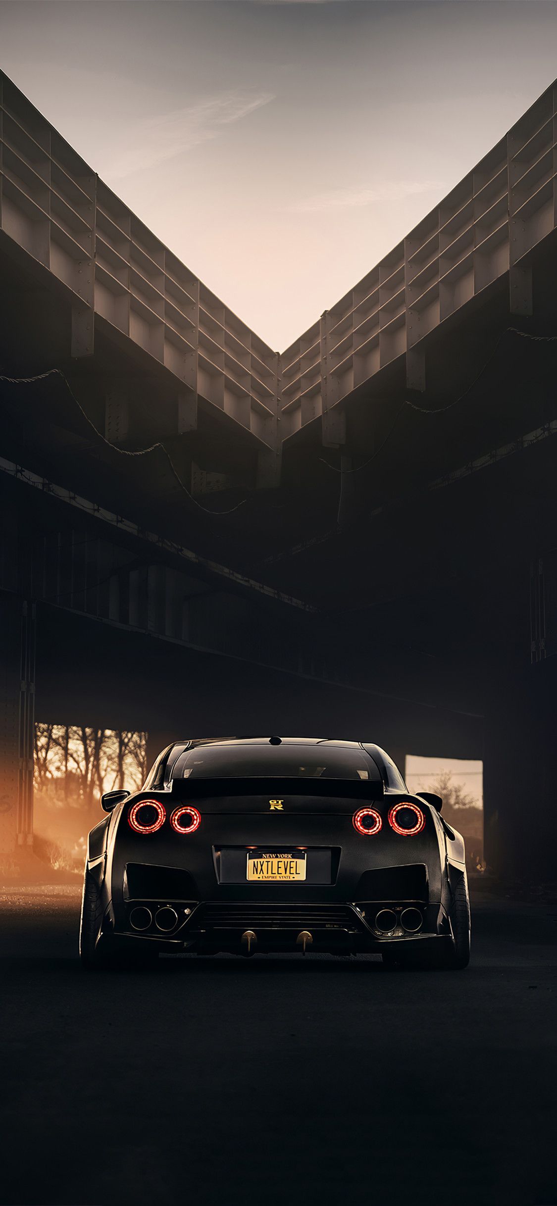 Nissan GTR nera, V6 biturbo, 1125x2436 Full HD Verticale, iPhone
