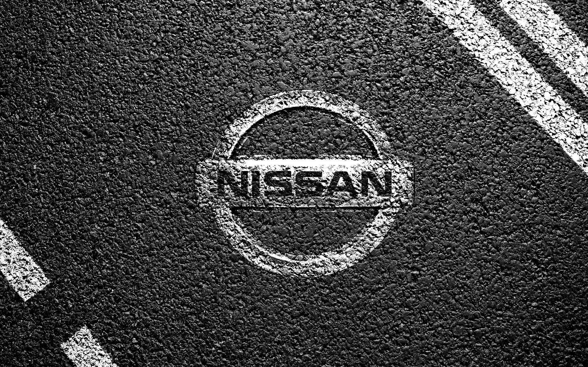 Logo Nissan su asfalto, 1920x1200 WUXGA, Desktop