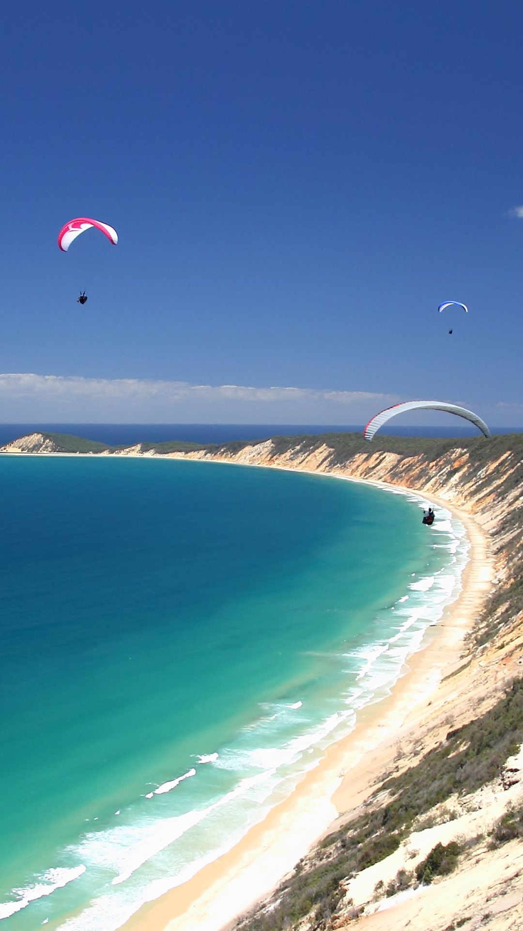Parapendii sopra spiaggia costiera, 1080x1920 Full HD Verticale, iPhone Plus