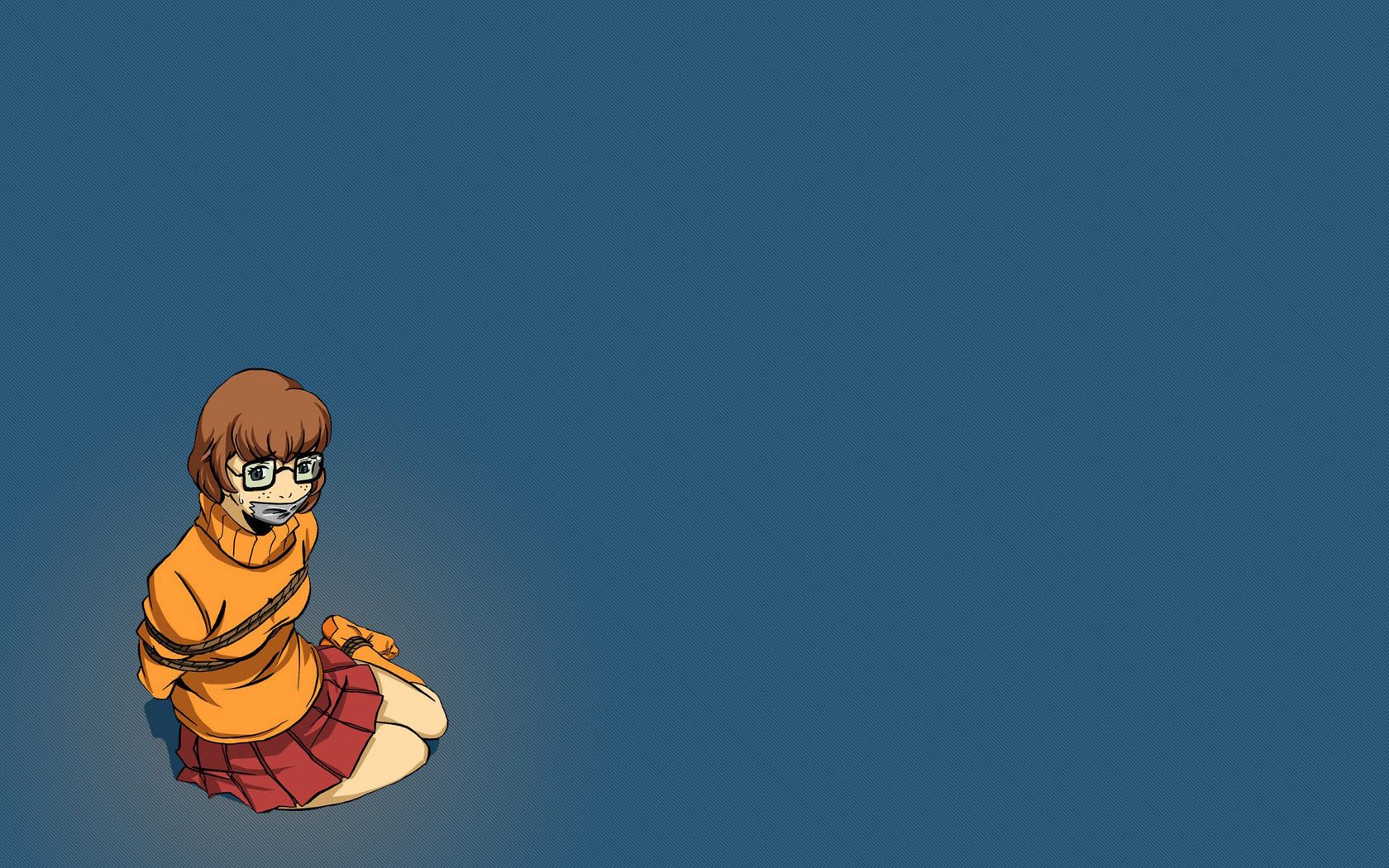 Velma seduta sfondo blu, 1680x1050 HD Ready, PC