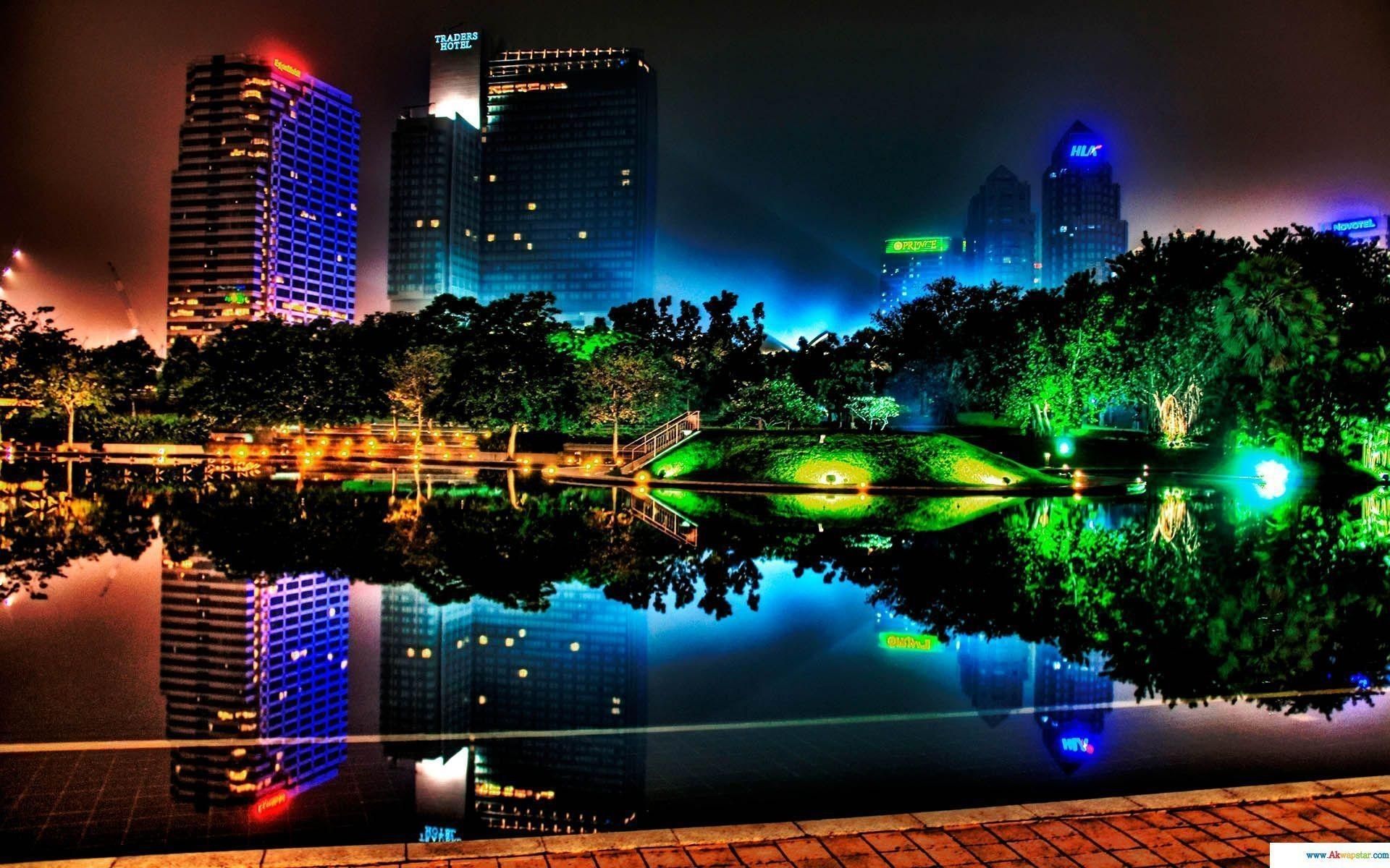 Città notturna con lago illuminato, 1920x1200 Full HD+ WUXGA, Desktop
