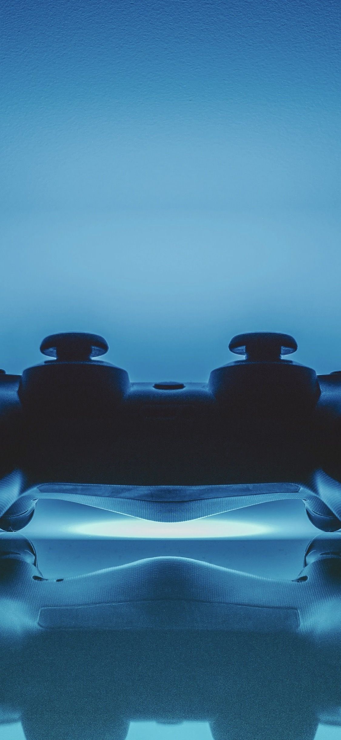 Controller PlayStation blu simmetrico, 1125x2436 Verticale, iPhone Air