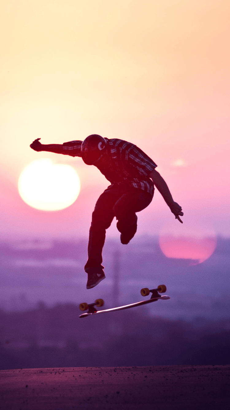 Skateboarder salto al tramonto, 750x1334 Full HD Verticale, iPhone