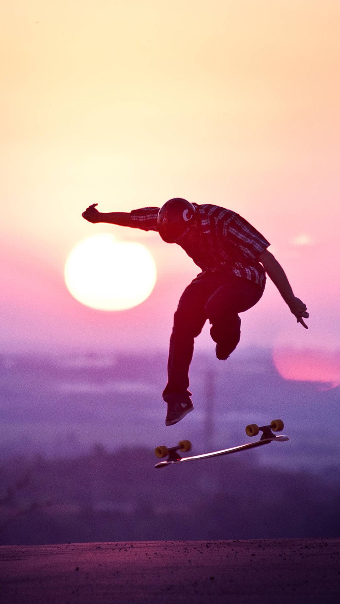 Skater in salto al tramonto, 1080x1920 Verticale, iPhone