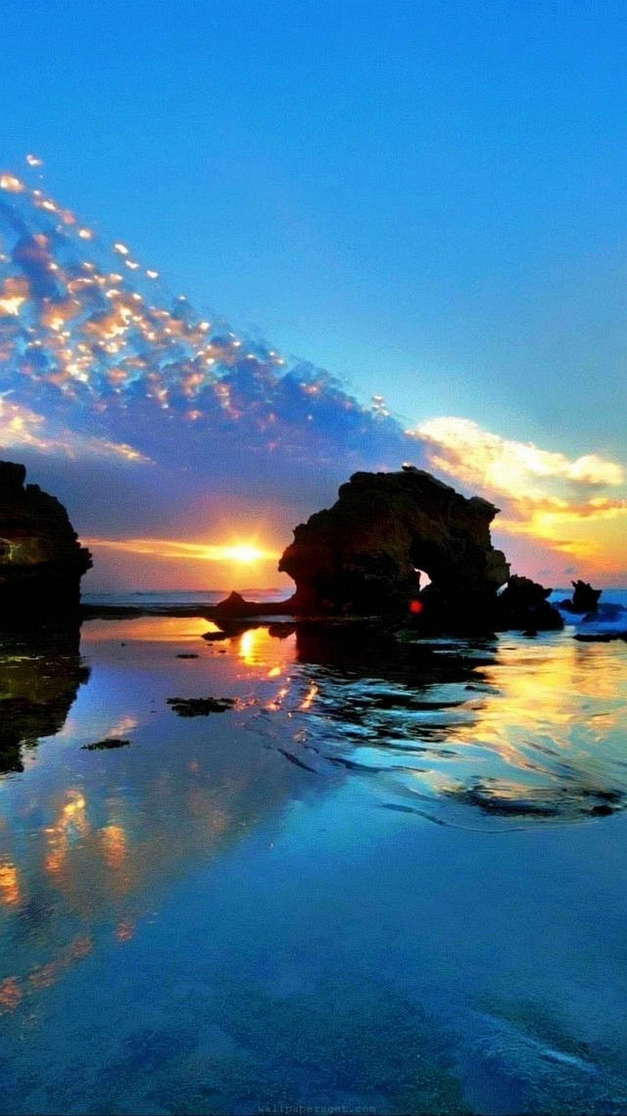 Tramonto su spiaggia rocciosa, 2160x3840 Verticale, Motorola