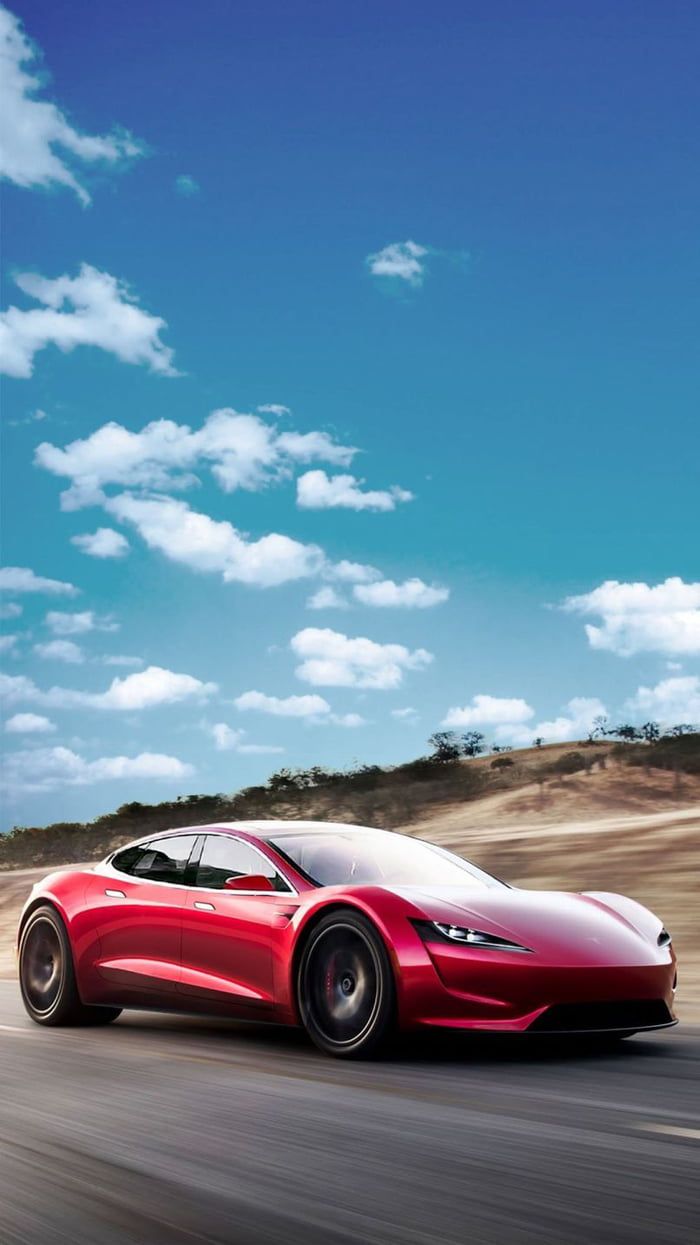 Tesla Roadster rossa su strada, 700x1245 Verticale, Telefono