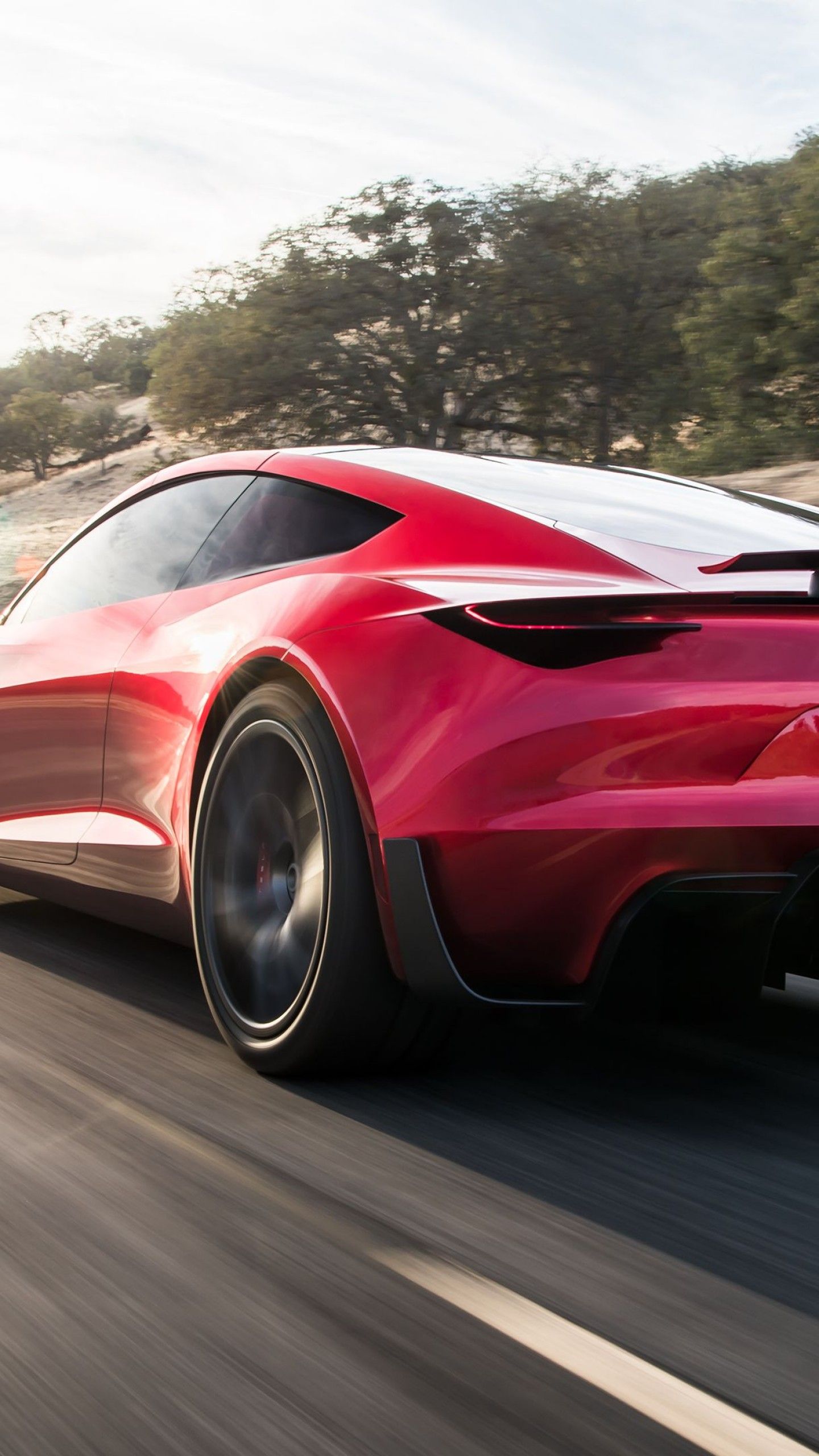 Tesla Roadster rossa su strada, 1440x2560 Full HD Verticale, iPhone