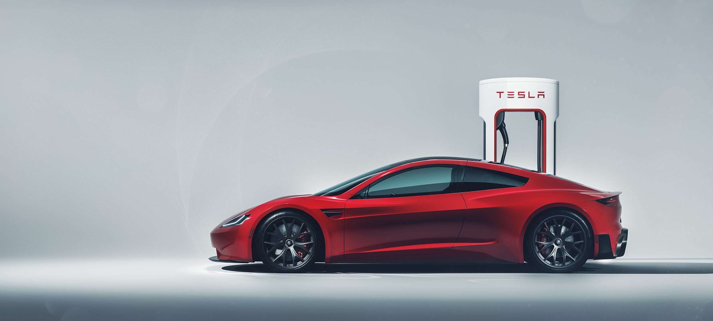 Tesla Roadster rossa in ricarica, auto elettrica, 2500x1126 Ultrawide, Dual Monitor
