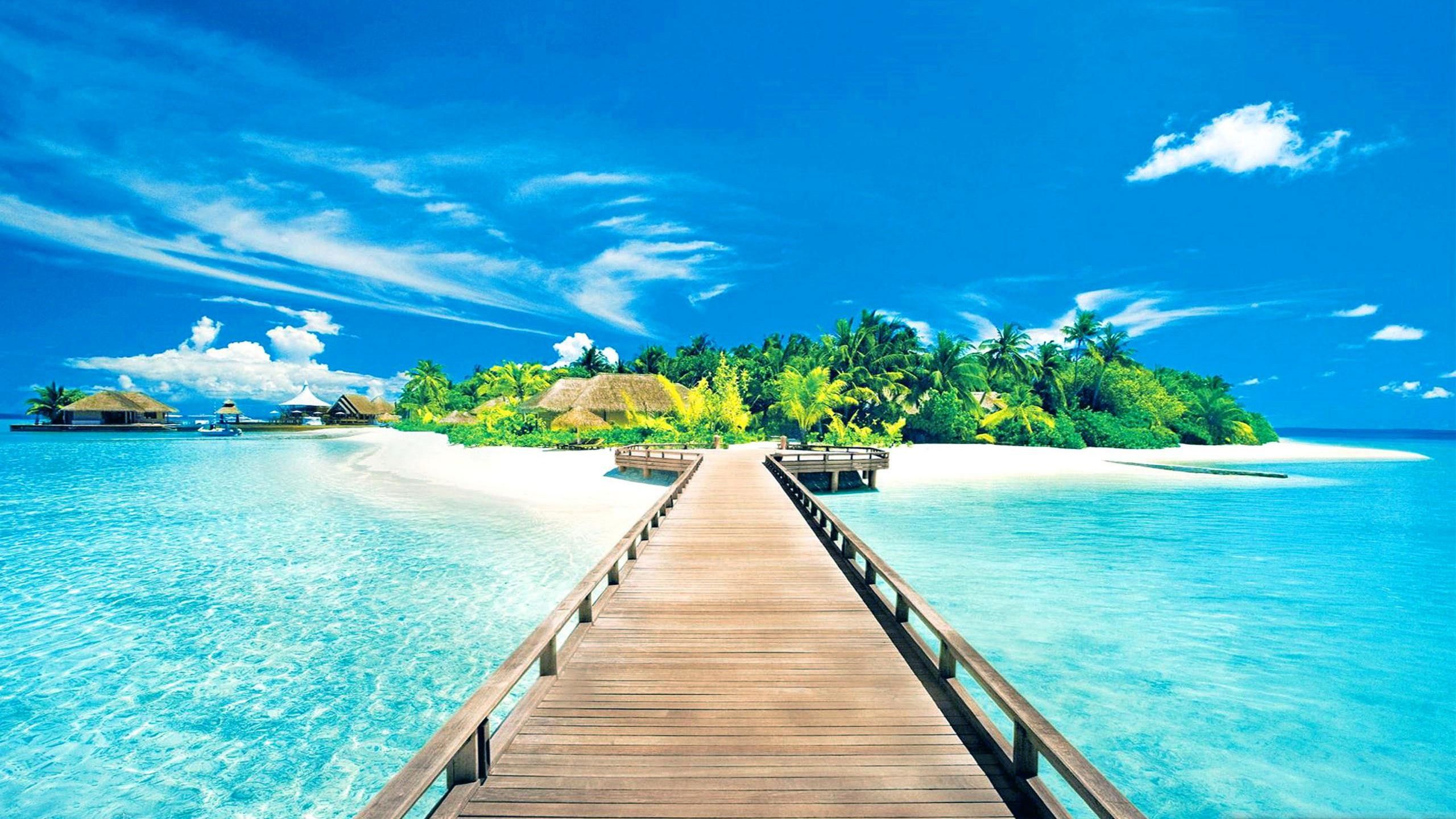 Isola tropicale con pontile in legno, 2560x1440 QHD, Laptop