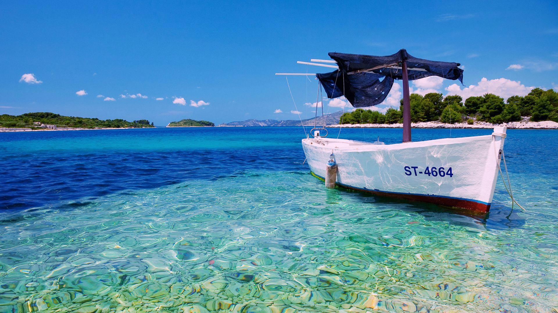 Barca su mare cristallino, 1920x1080 Full HD 1080p, Monitor Gaming